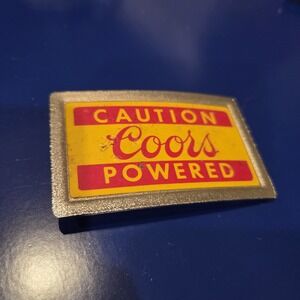 Vintage Caution Coors Powered Enamel Belt Buckle Yellow Red Silver